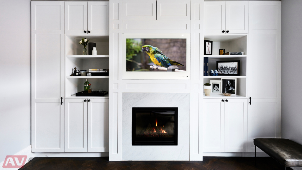 TVs above the fireplace in the interior